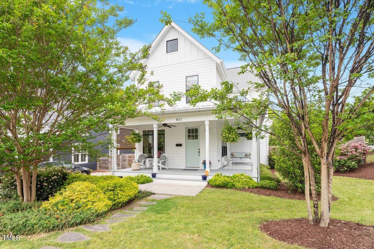 811 East Lane Street Raleigh, NC 27601 - Photo 1 of 35 a front view of a house with garden