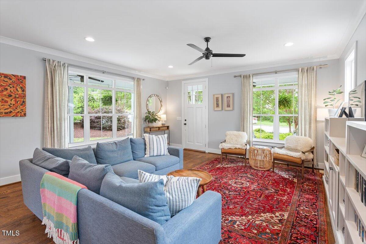 811 East Lane Street Raleigh, NC 27601 - Photo 11 of 35 a living room with furniture and a large window