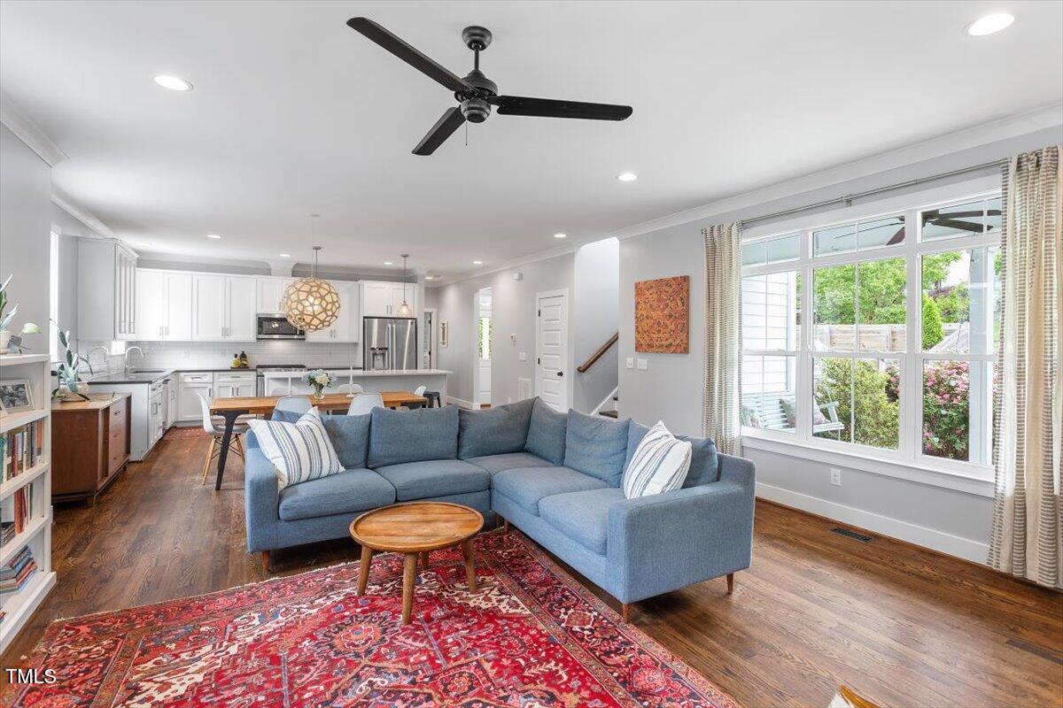 811 East Lane Street Raleigh, NC 27601 - Photo 12 of 35 a living room with furniture and a large window