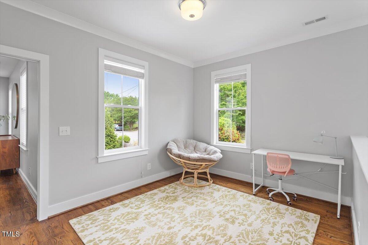811 East Lane Street Raleigh, NC 27601 - Photo 25 of 35 a work room with furniture and a window