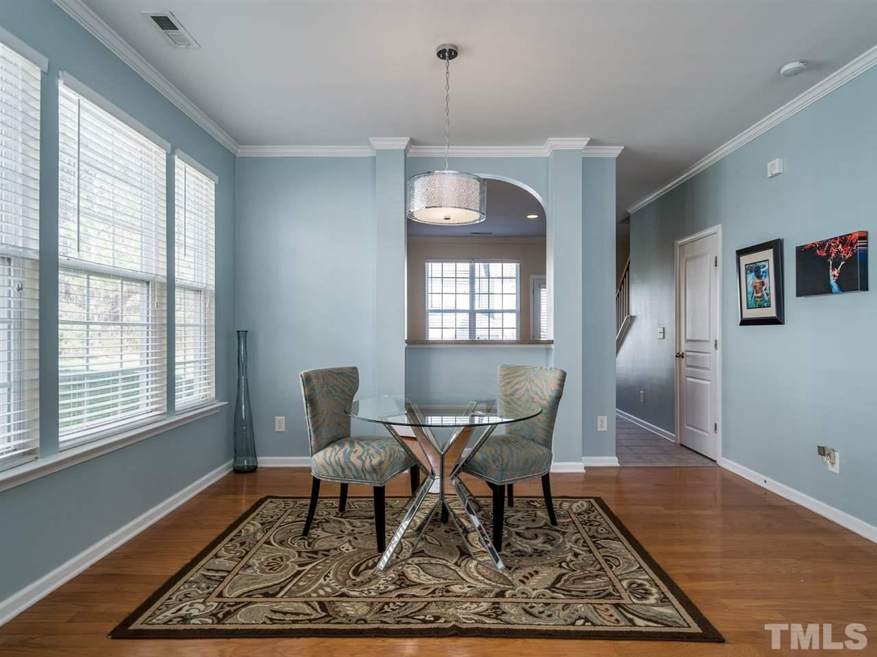 4414 Sugarbend Way Raleigh, NC 27606 - Photo 10 of 24 The arched window adds architectural interest.
