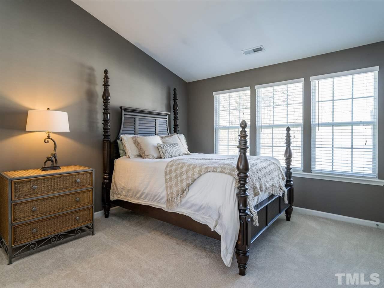 4414 Sugarbend Way Raleigh, NC 27606 - Photo 16 of 24 The private master suite has two closets.