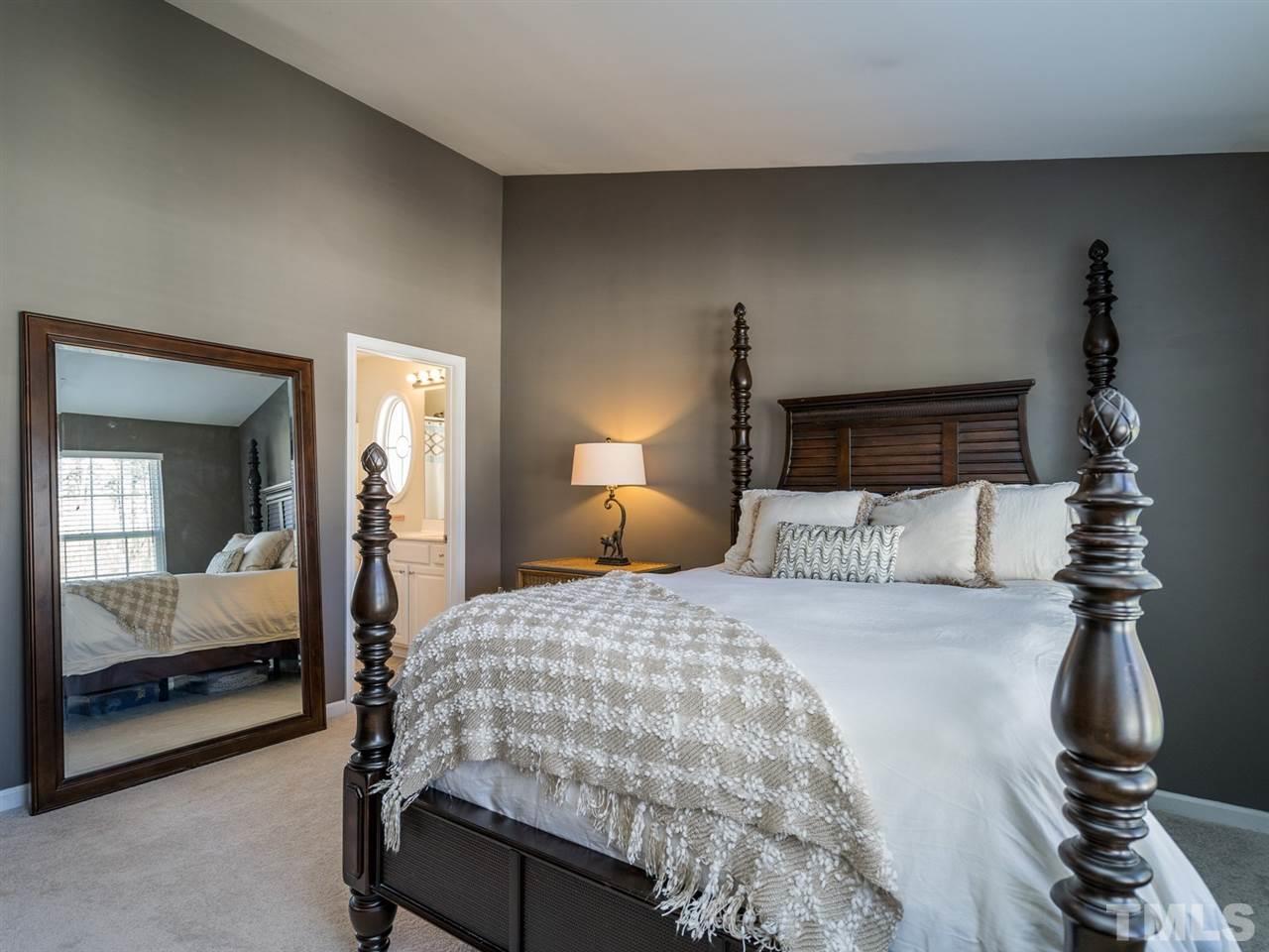 4414 Sugarbend Way Raleigh, NC 27606 - Photo 17 of 24 The master suite has also a vaulted ceiling which adds character to this lovely space.