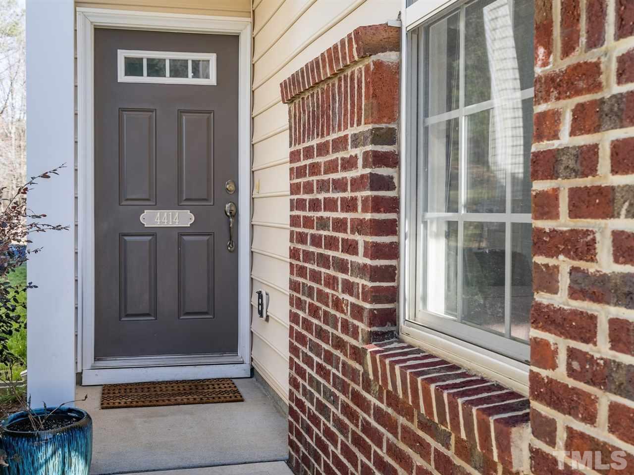 4414 Sugarbend Way Raleigh, NC 27606 - Photo 3 of 24 The covered front porch is an added bonus.