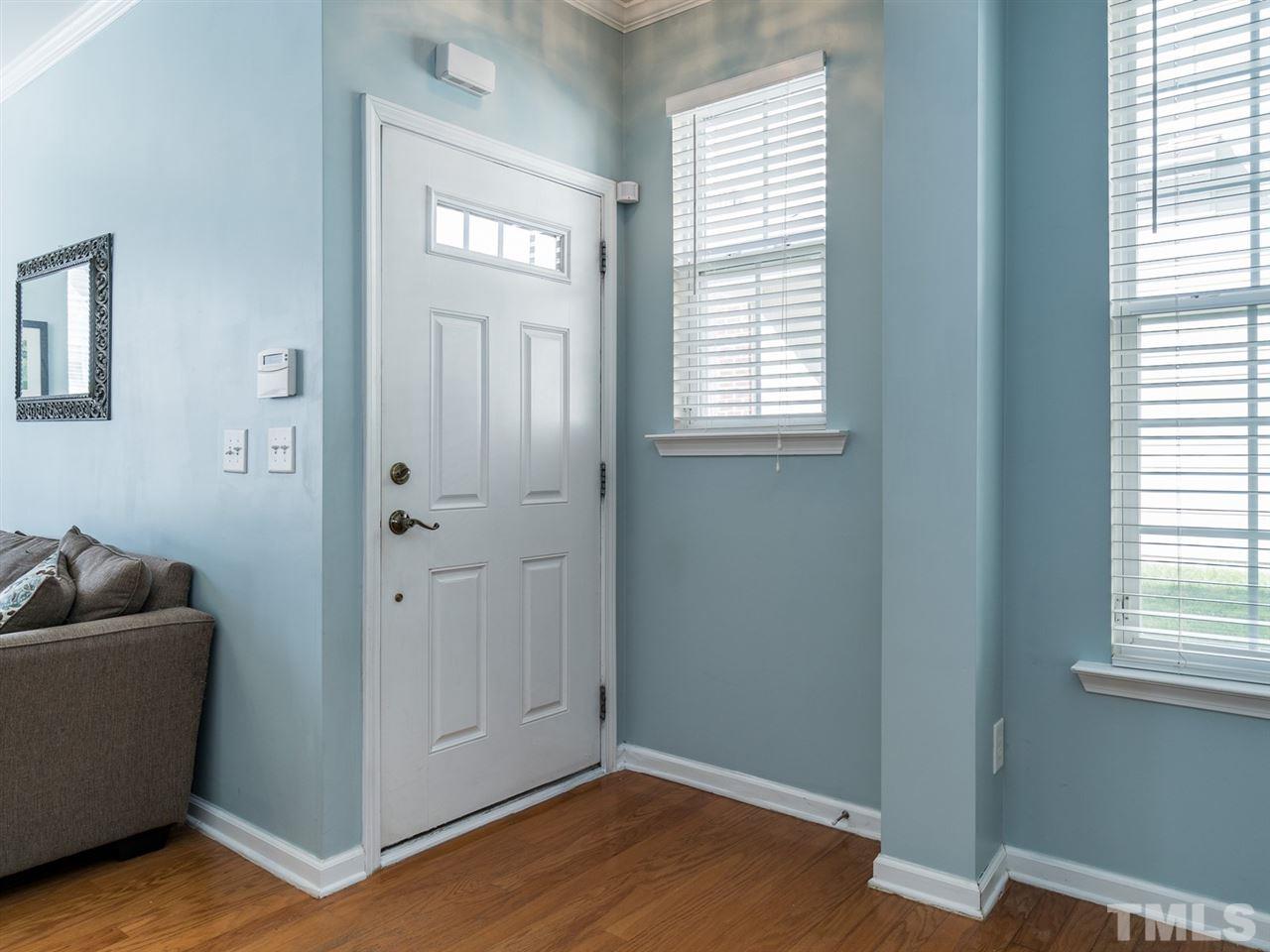 4414 Sugarbend Way Raleigh, NC 27606 - Photo 4 of 24 Beautiful hardwood floors welcome you to this move-in ready home.