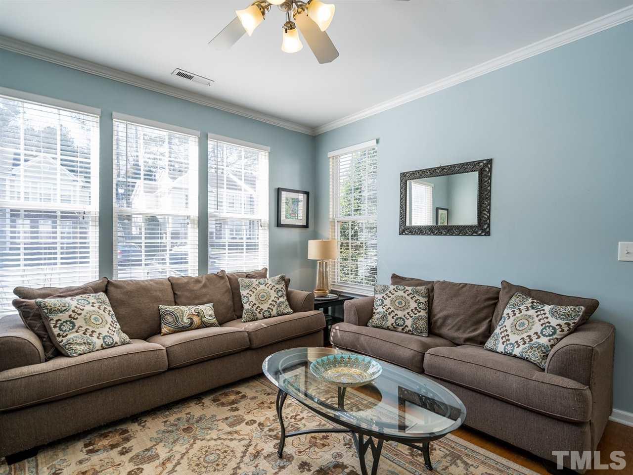 4414 Sugarbend Way Raleigh, NC 27606 - Photo 7 of 24 The home has a neutral color palette that flows throughout.