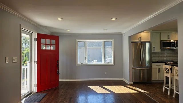 a view of livingroom with hardwood floor and hallway