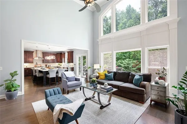 a living room with furniture or rug and a potted plant