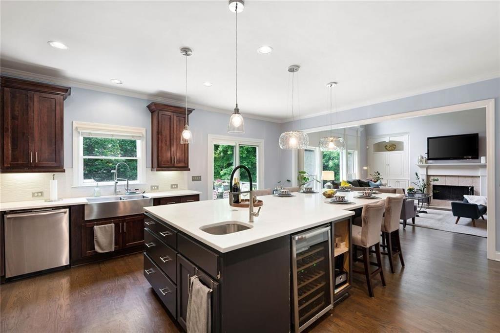 3045 Moss Stone Lane Southwest Marietta, GA 30064 - Photo 24 of 65 a kitchen with a sink stove and wooden floor