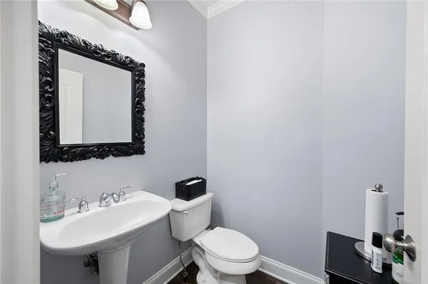 a view of a bathroom with a sink and a window