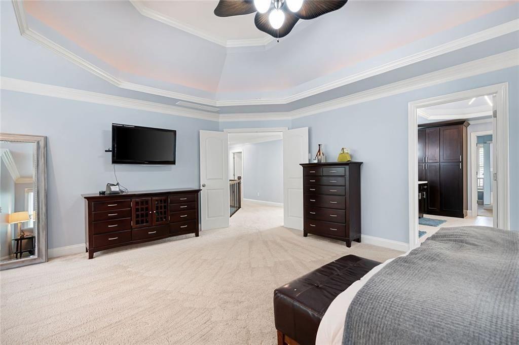 3045 Moss Stone Lane Southwest Marietta, GA 30064 - Photo 31 of 65 a bedroom with a bed and a television