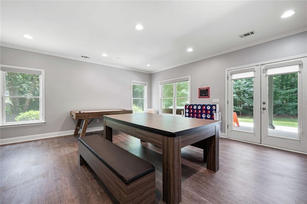 3045 Moss Stone Lane Southwest Marietta, GA 30064 - Photo 55 of 65 a view of a room with furniture and wooden floor