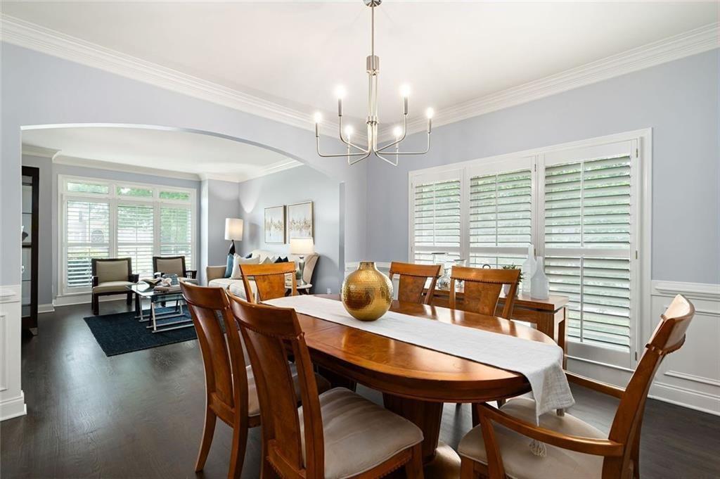 3045 Moss Stone Lane Southwest Marietta, GA 30064 - Photo 9 of 65 a view of a dining room with furniture window and wooden floor