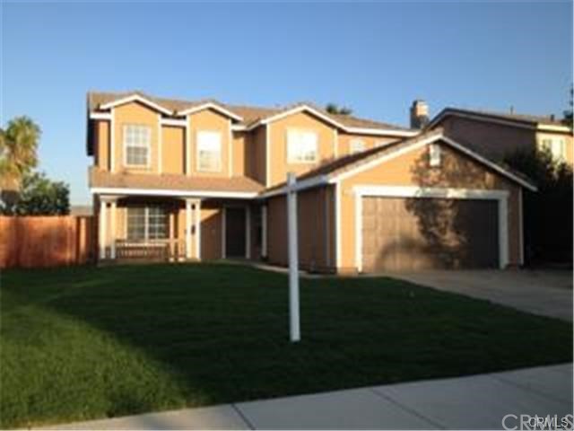 7622 Greenock Way Riverside, CA 92508 - Photo 1 of 1 a front view of a house with a yard