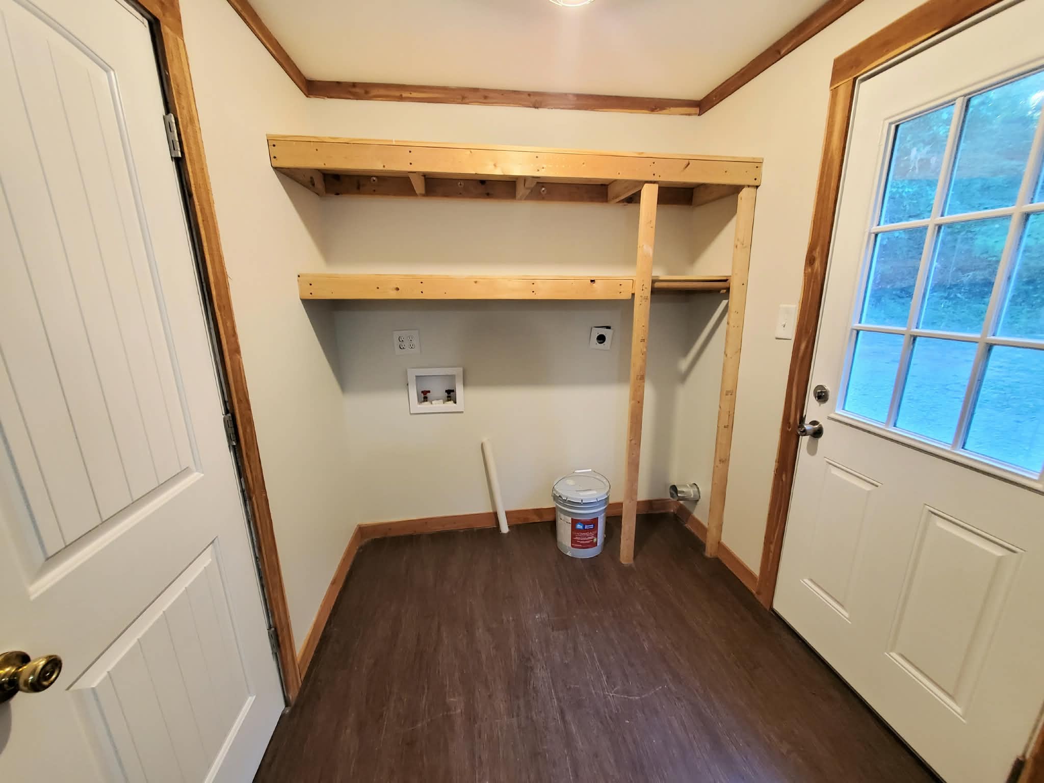 210 Rawls Creek Road Gordonsville, TN 38563 - Photo 13 of 13 a view of an empty room with wooden floor and a window