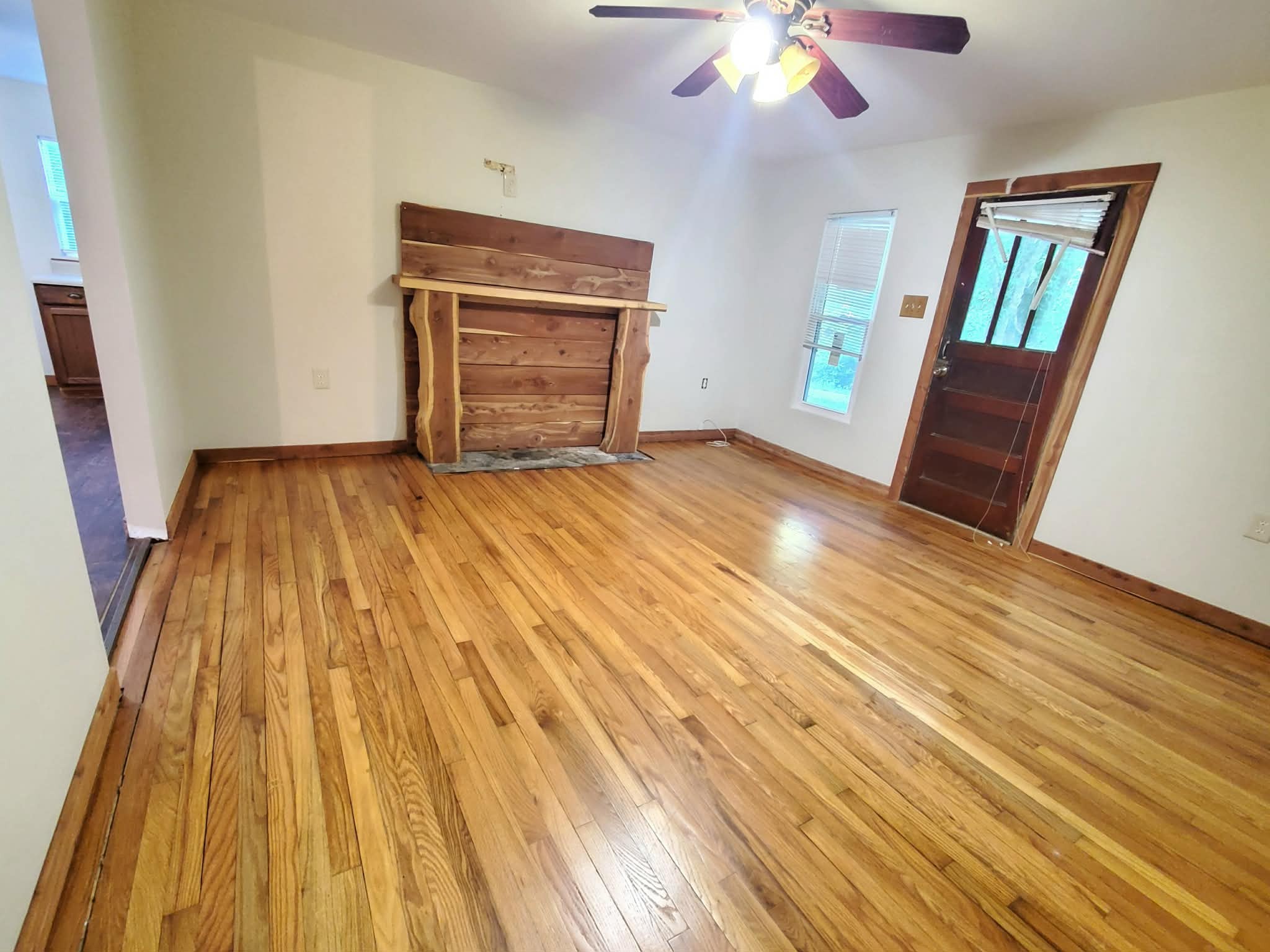 210 Rawls Creek Road Gordonsville, TN 38563 - Photo 7 of 13 a bedroom with a bed and wooden floor