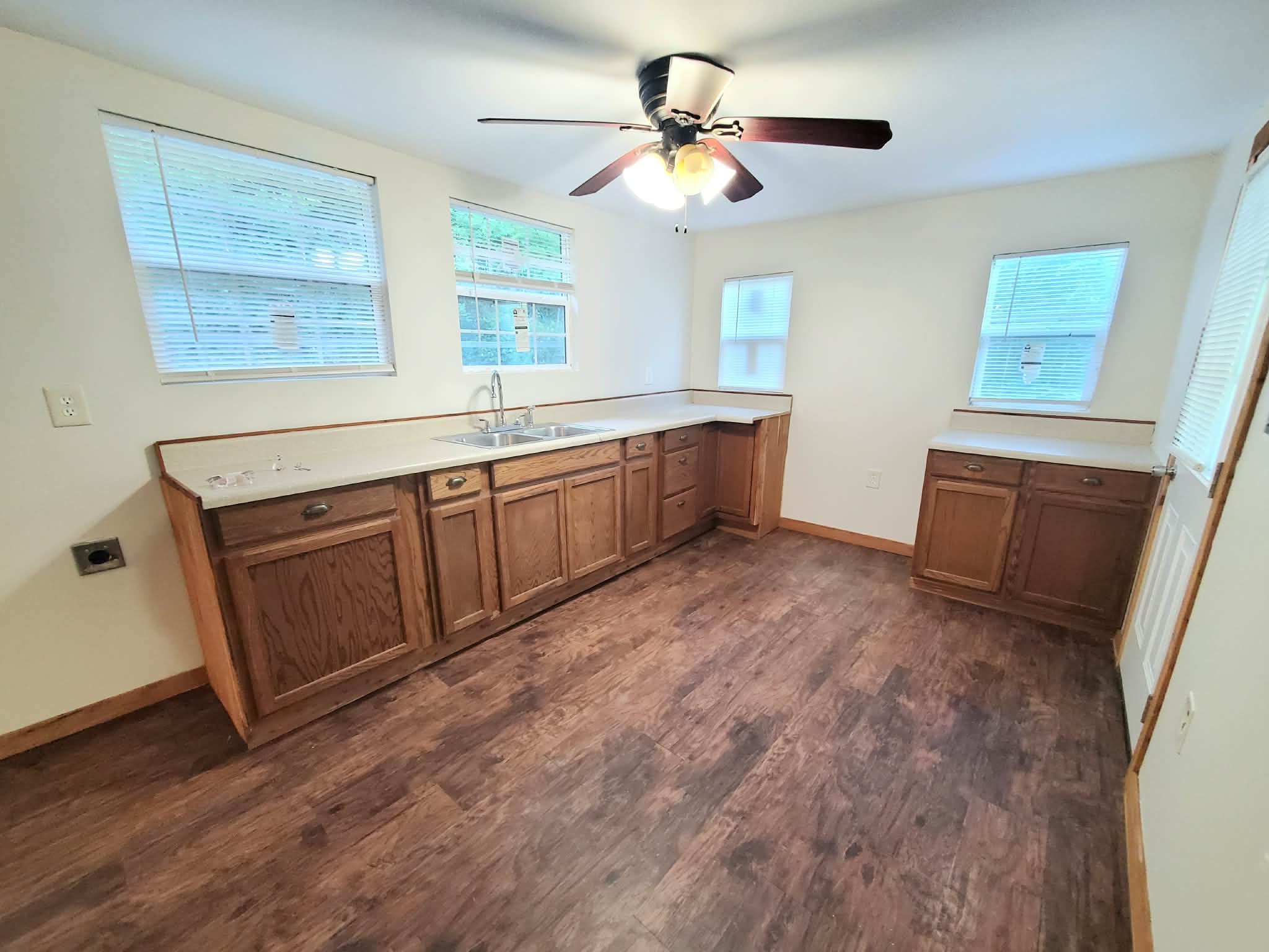 210 Rawls Creek Road Gordonsville, TN 38563 - Photo 10 of 13 a view of kitchen with sink and wooden floor