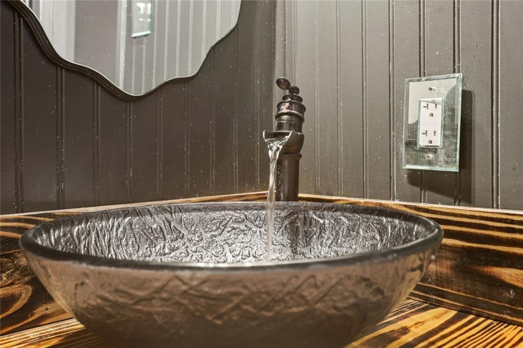 6300 East Stubbs Road Atlanta, GA 30349 - Photo 19 of 29 a view of a bathtub in a room