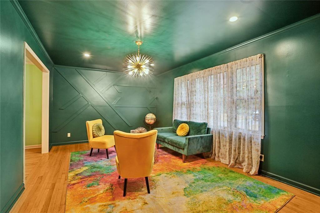 6300 East Stubbs Road Atlanta, GA 30349 - Photo 20 of 29 a view of a dining room with a table and chairs