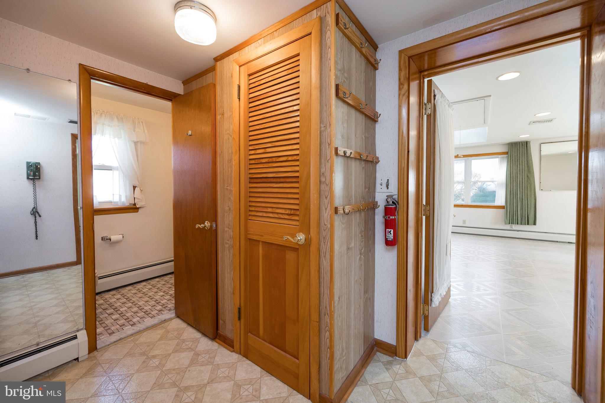 24 East 7 Stars Road Phoenixville, PA 19460 - Photo 11 of 33 Hallway into Hall Bath and Sunroom