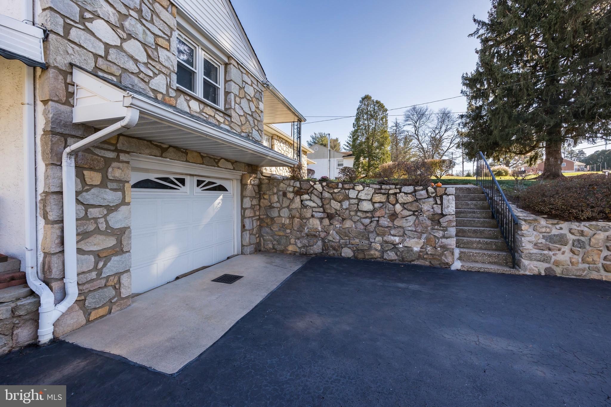 24 East 7 Stars Road Phoenixville, PA 19460 - Photo 33 of 33 Stone Retaining Wall and 1-Car Garage