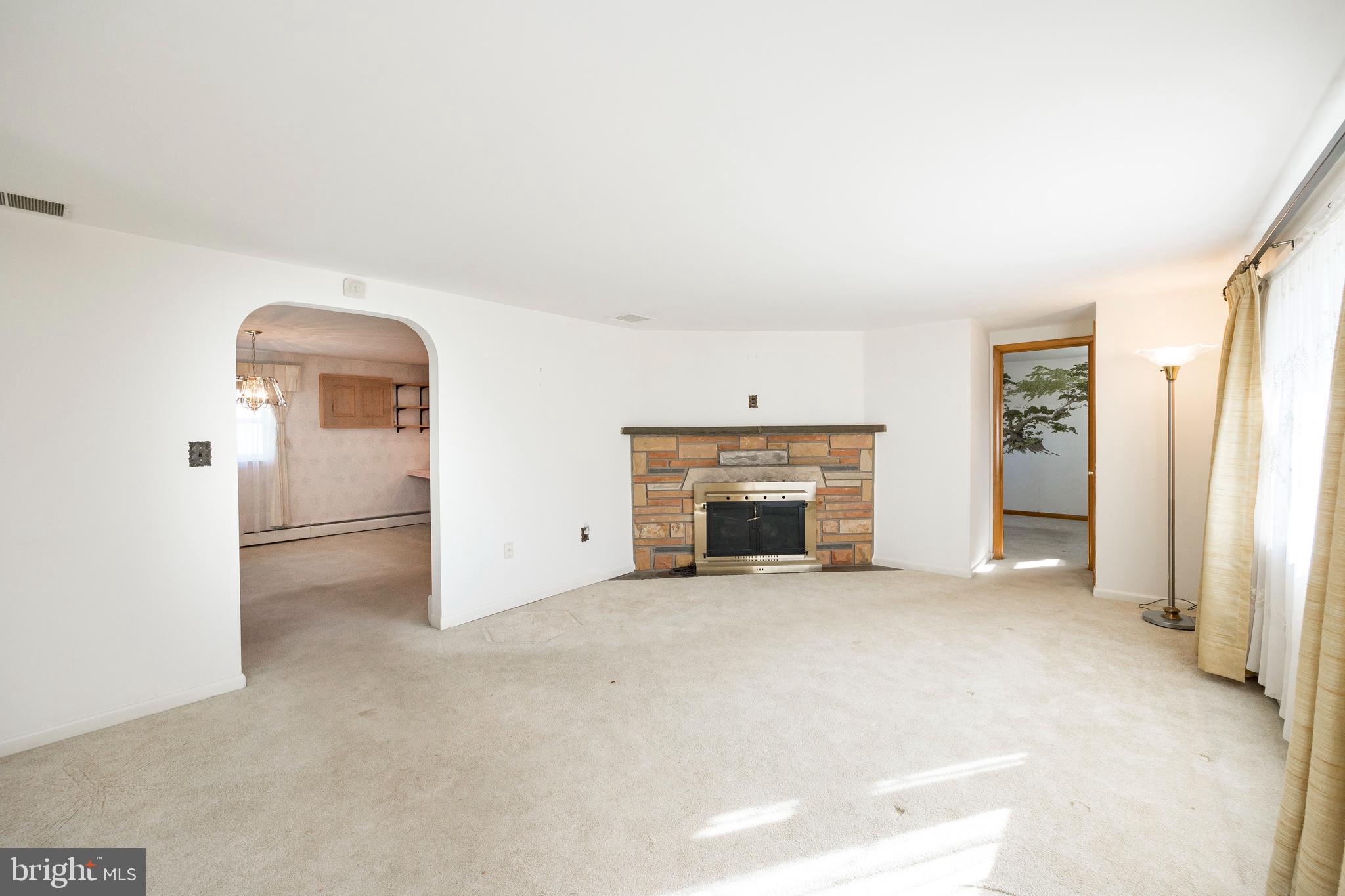 24 East 7 Stars Road Phoenixville, PA 19460 - Photo 4 of 33 Living Room with Wood Burning Fireplace