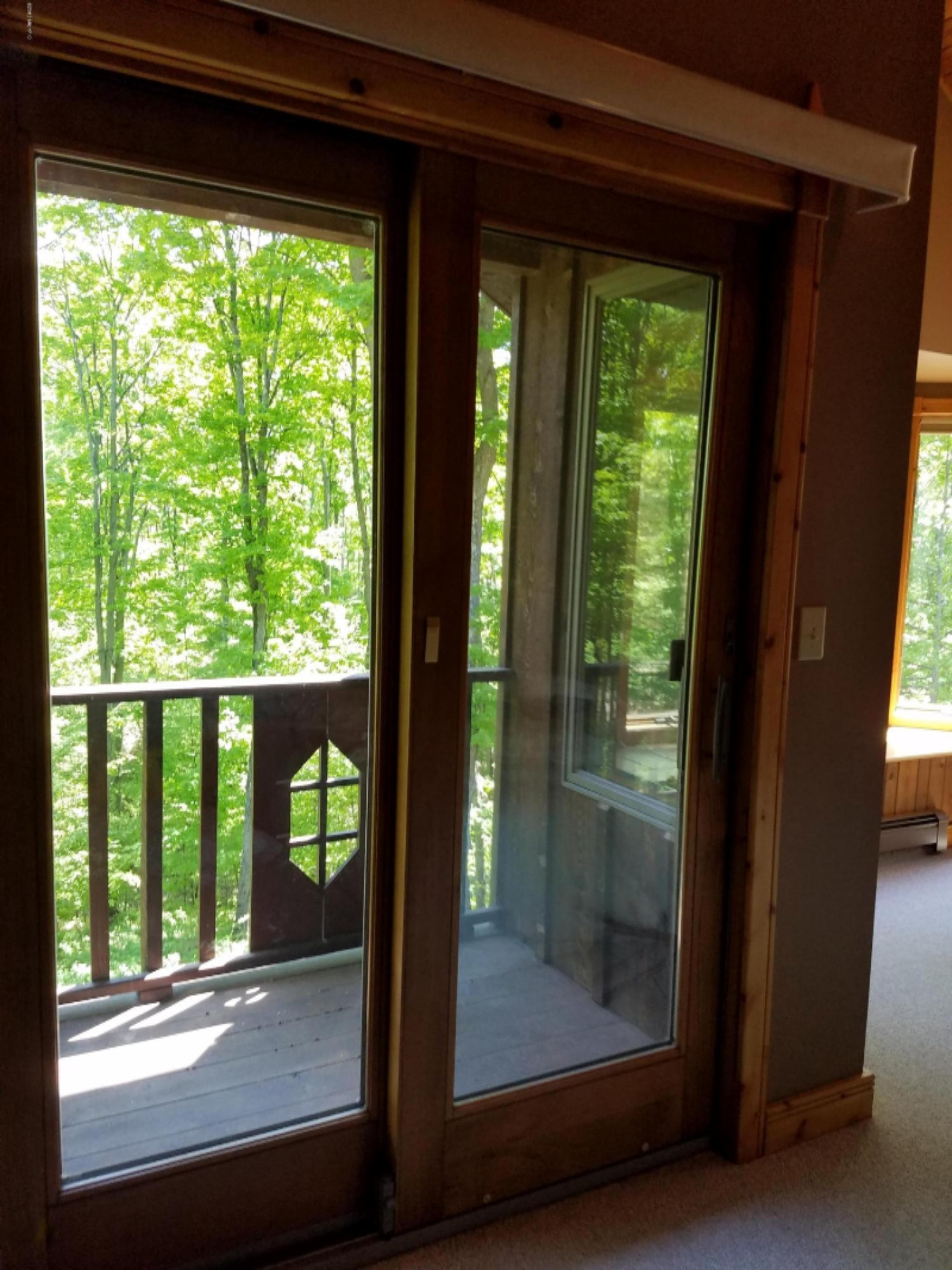 4505 Barney Road Traverse City, MI 49684 - Photo 52 of 56 Master Bedroom Deck