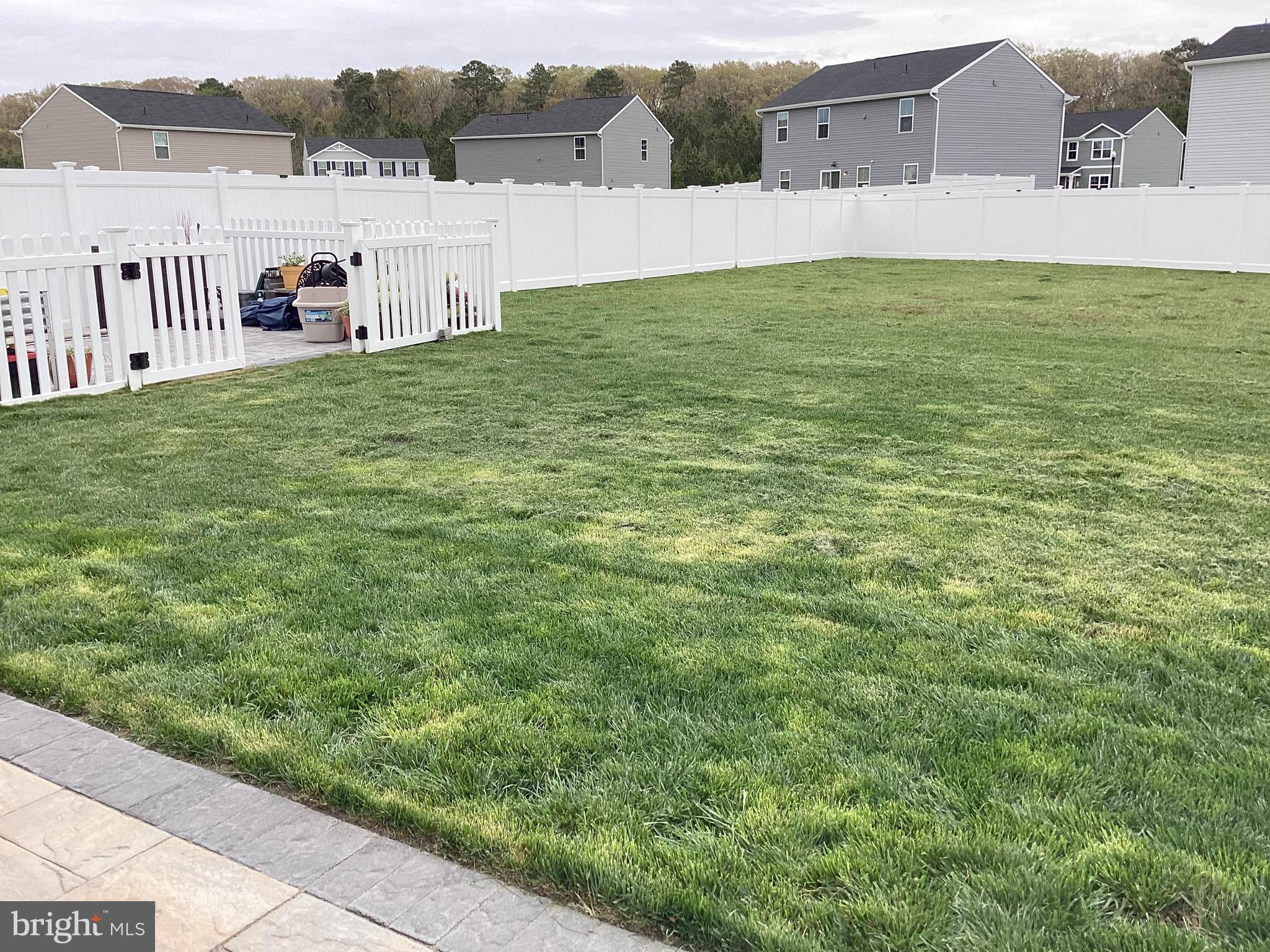 212 Bowline Drive Cambridge, MD 21613 - Photo 18 of 19 a view of a house with a yard