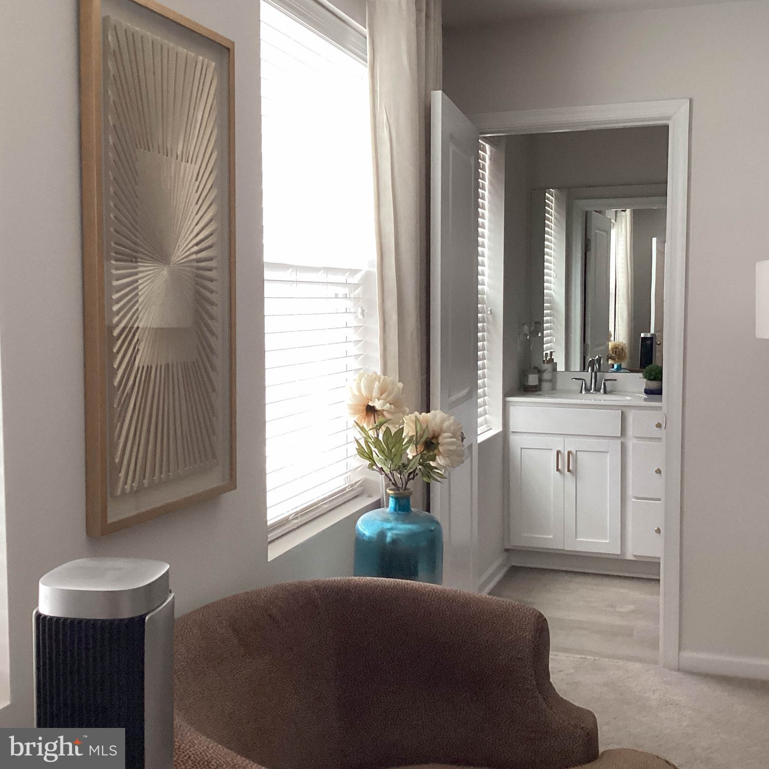 212 Bowline Drive Cambridge, MD 21613 - Photo 10 of 19 a living room with furniture and a window