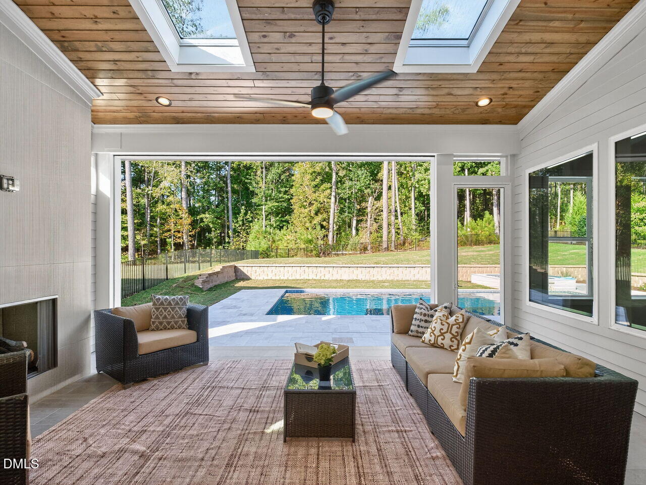1309 Montvale Ridge Drive Cary, NC 27519 - Photo 19 of 24 a living room with furniture and a floor to ceiling window