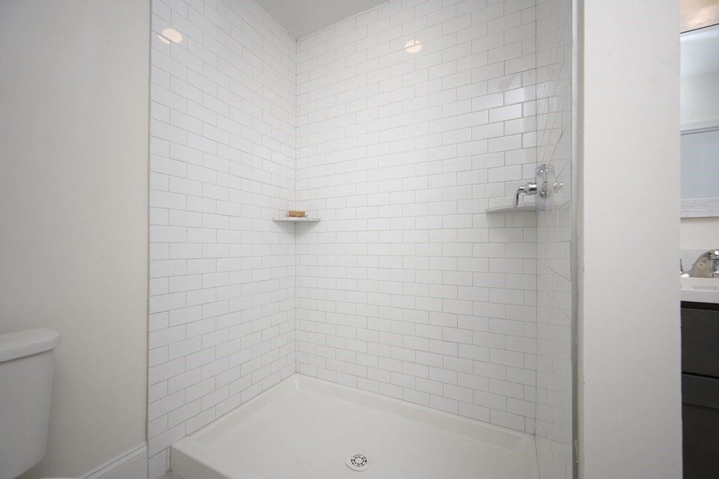 35 Metacomet Road, Unit 35 West Bridgewater, MA 02379 - Photo 16 of 34 a close up of a bathtub