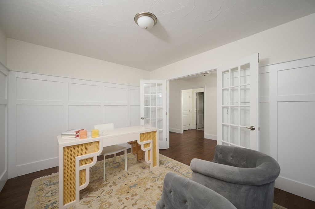 35 Metacomet Road, Unit 35 West Bridgewater, MA 02379 - Photo 21 of 34 a living room with furniture and a wooden floor