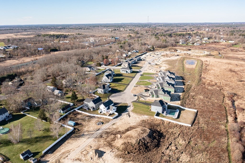 35 Metacomet Road, Unit 35 West Bridgewater, MA 02379 - Photo 28 of 34 an aerial view of residential houses with outdoor space