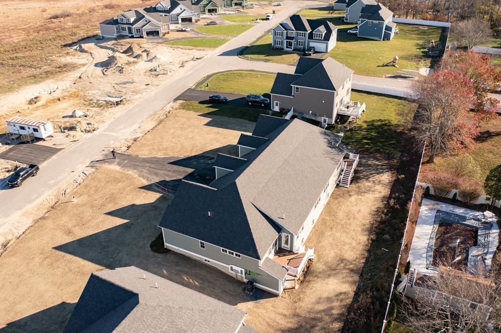 35 Metacomet Road, Unit 35 West Bridgewater, MA 02379 - Photo 29 of 34 an aerial view of a house with a yard