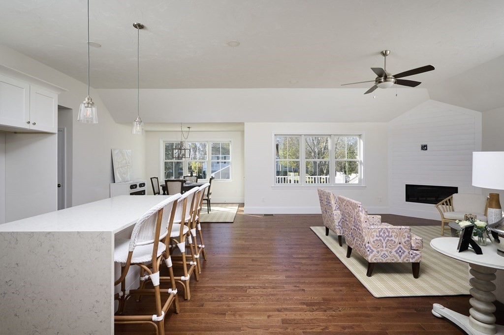35 Metacomet Road, Unit 35 West Bridgewater, MA 02379 - Photo 3 of 34 a dining room with furniture and wooden floor