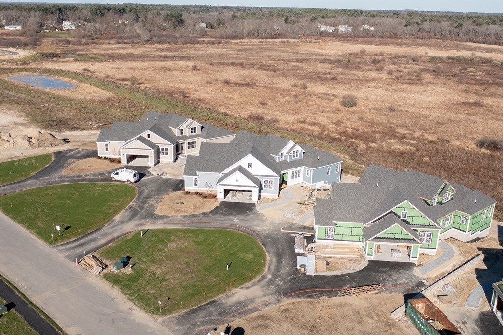 35 Metacomet Road, Unit 35 West Bridgewater, MA 02379 - Photo 32 of 34 an aerial view of a house with outdoor space