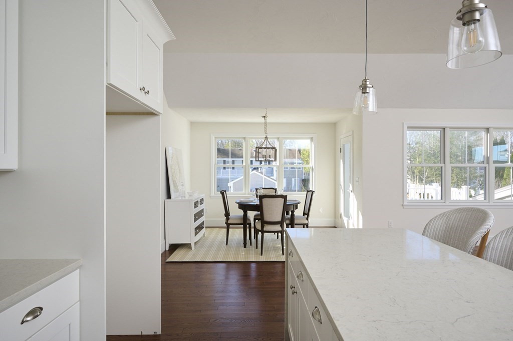 35 Metacomet Road, Unit 35 West Bridgewater, MA 02379 - Photo 10 of 34 a view of a dining room with furniture window and outside view