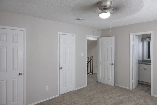 an empty room with a bathroom