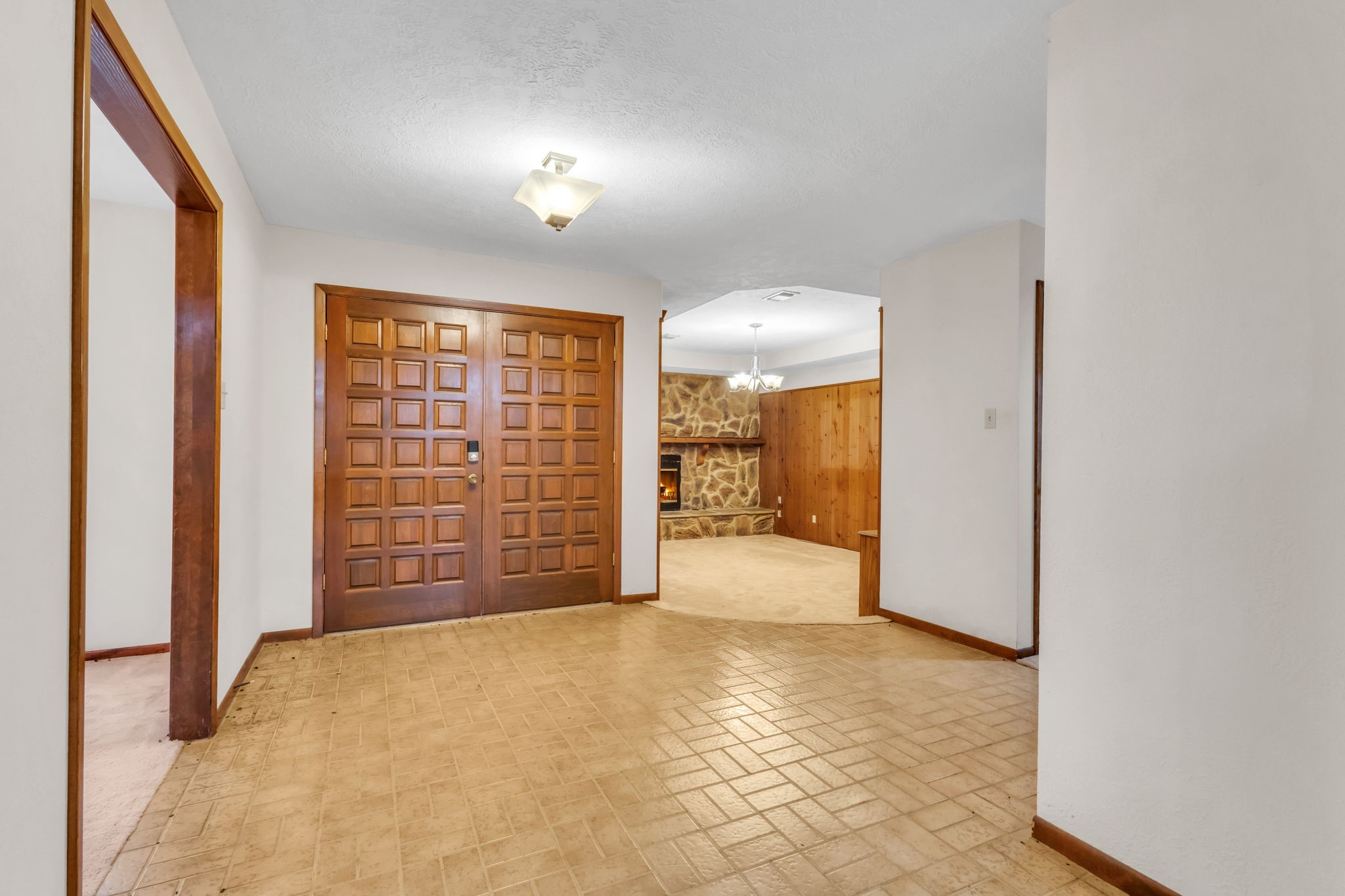 222 County Road 3085 Colmesneil, TX 75938 - Photo 24 of 50 a view of an empty room with a fireplace and a window