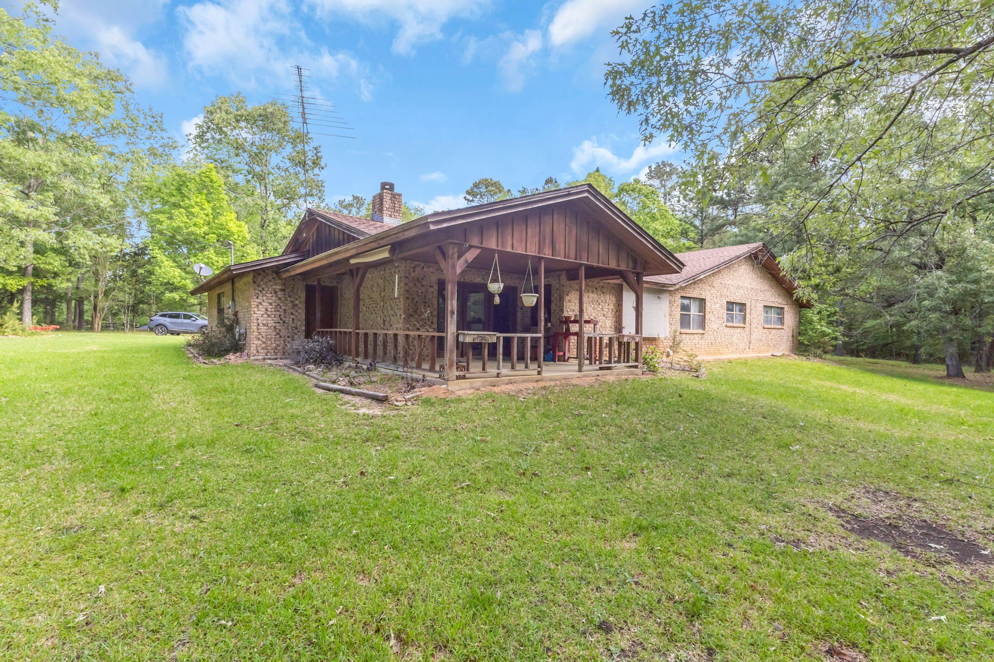 222 County Road 3085 Colmesneil, TX 75938 - Photo 40 of 50 a view of house with backyard and entertaining space