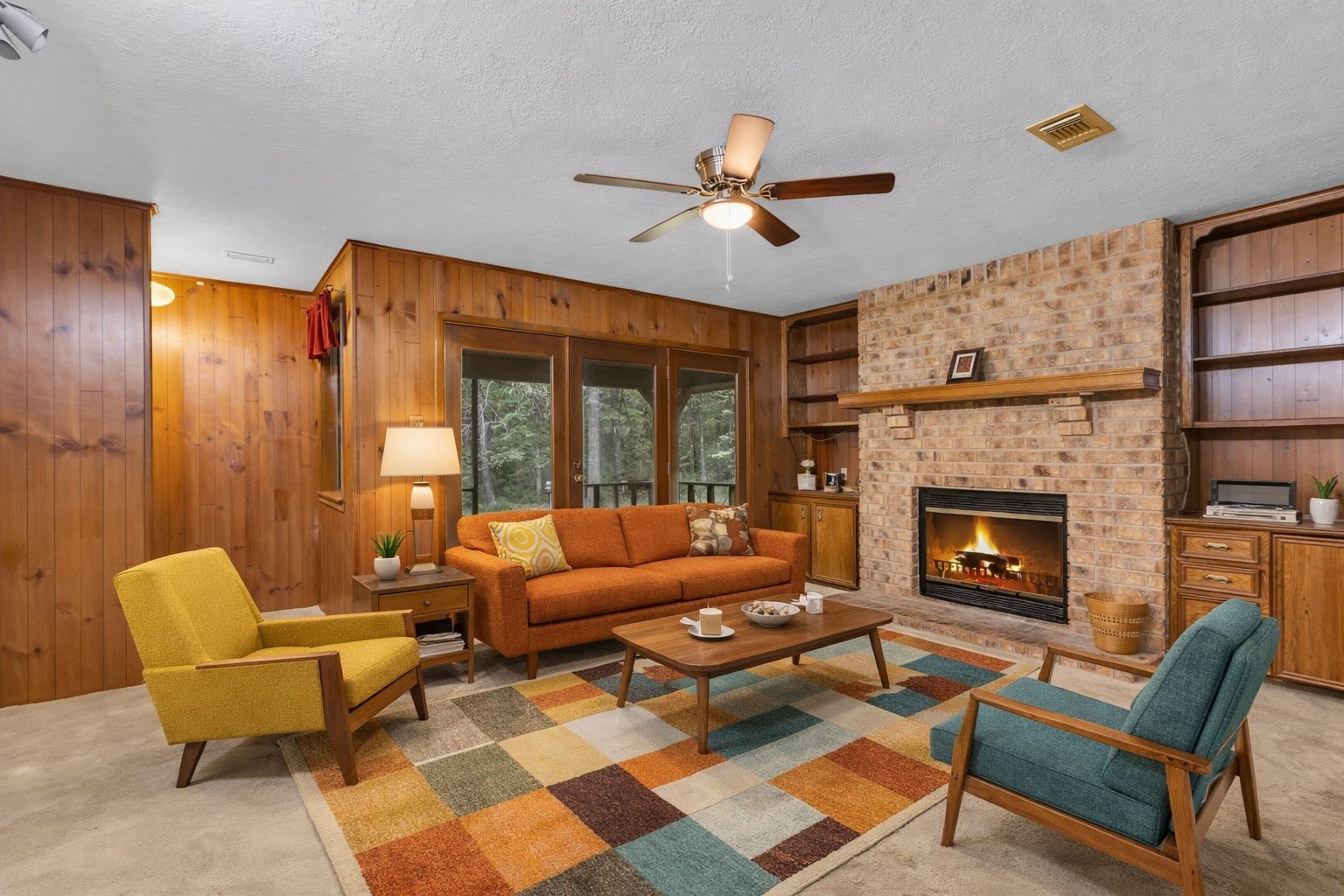 222 County Road 3085 Colmesneil, TX 75938 - Photo 9 of 50 a living room with furniture and a fireplace