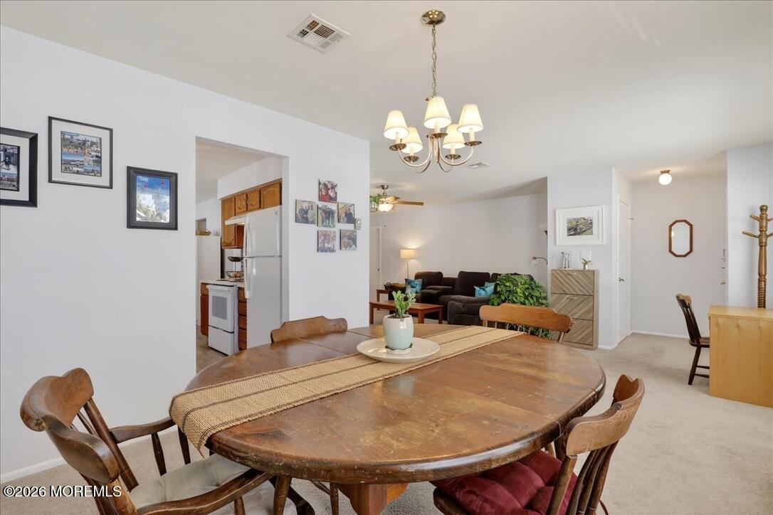 32 Abbey Road Brick, NJ 08723 - Photo 12 of 44 a view of a dining room with furniture