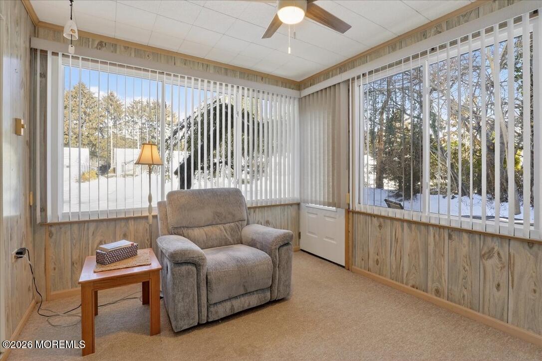 32 Abbey Road Brick, NJ 08723 - Photo 16 of 42 a living room with furniture and a large window
