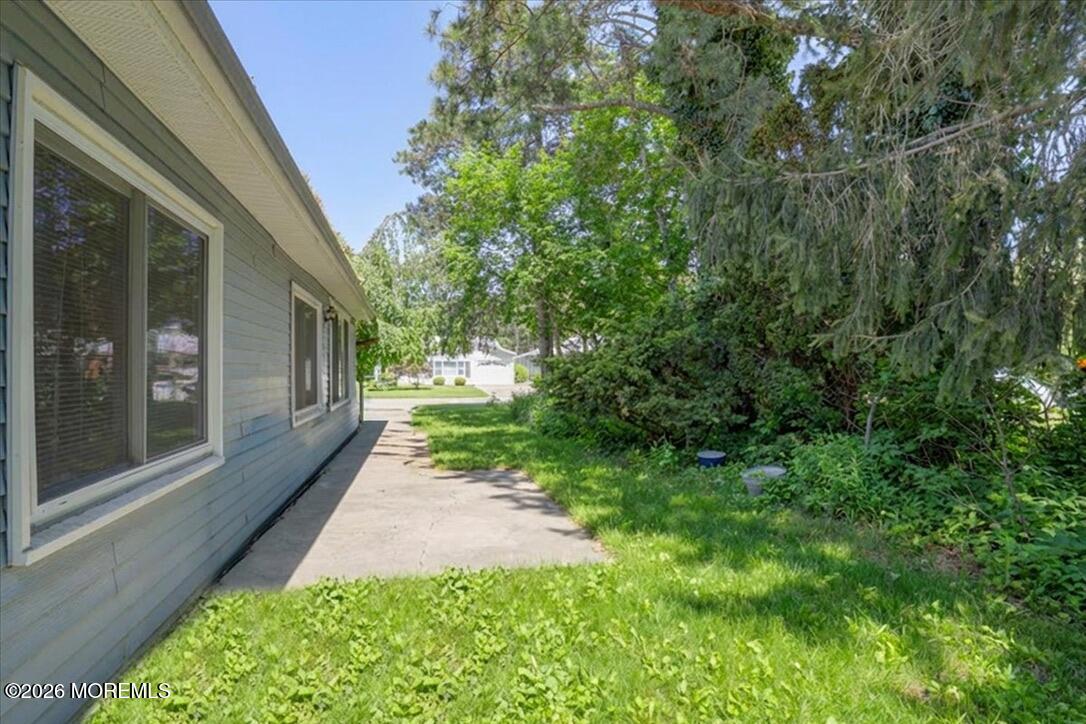 32 Abbey Road Brick, NJ 08723 - Photo 19 of 42 a view of a back yard