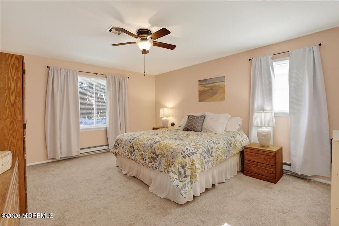 32 Abbey Road Brick, NJ 08723 - Photo 24 of 44 a bedroom with a bed and window