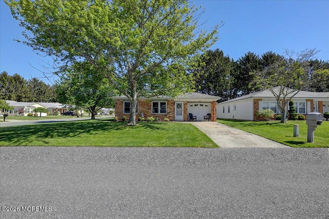 32 Abbey Road Brick, NJ 08723 - Photo 3 of 42 a view of house that has a yard
