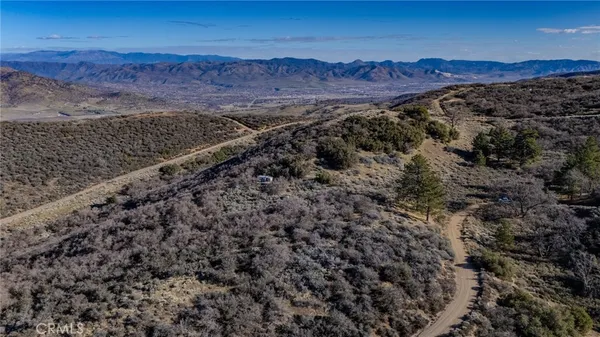 a view of mountain and mountain in the back