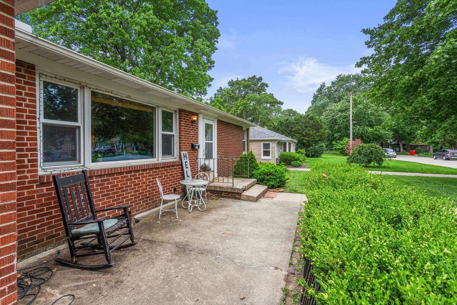 1117 West Union Street Champaign, IL 61821 - Photo 4 of 29 a view of a bench in the garden