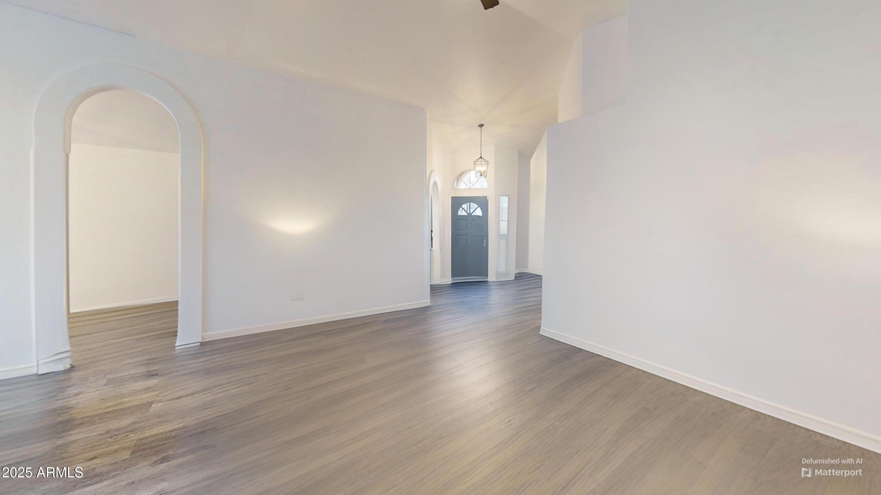 6458 East Raftriver Street Mesa, AZ 85215 - Photo 15 of 75 a view of a room with wooden floor