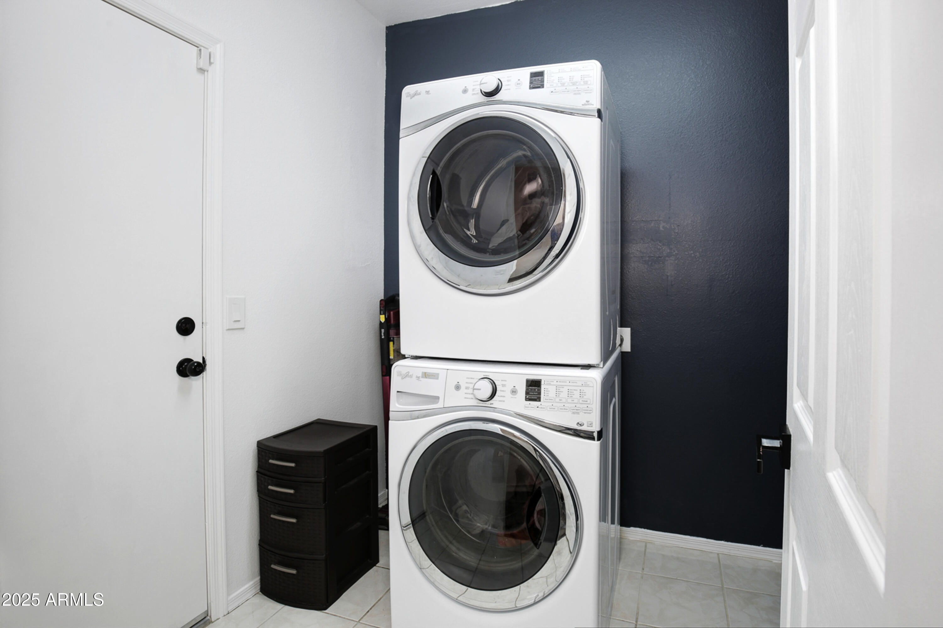 6458 East Raftriver Street Mesa, AZ 85215 - Photo 48 of 75 a utility room with dryer and washer